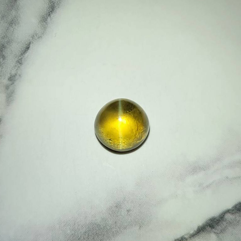 圖示-金綠貓眼裸石(Chrysoberyl cat’s eye)